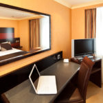 Classic double room at Mercure Chester Abbots Well Hotel, desk with laptop and TV