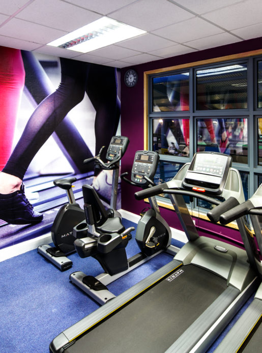 Treadmills, exercise bikes and rowing machines in the Feel Good Health Club at Mercure Chester Abbots Well Hotel