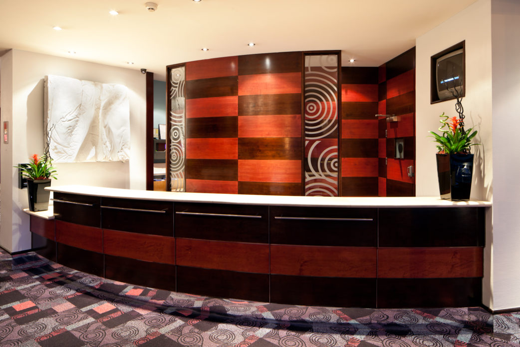 Reception desk at Mercure Chester Abbots Well Hotel