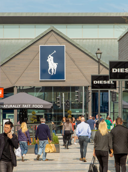 Cheshire Oaks retail village near Mercure Chester Abbots Well Hotel.
