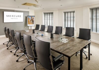 Meeting room set out in boardroom setting