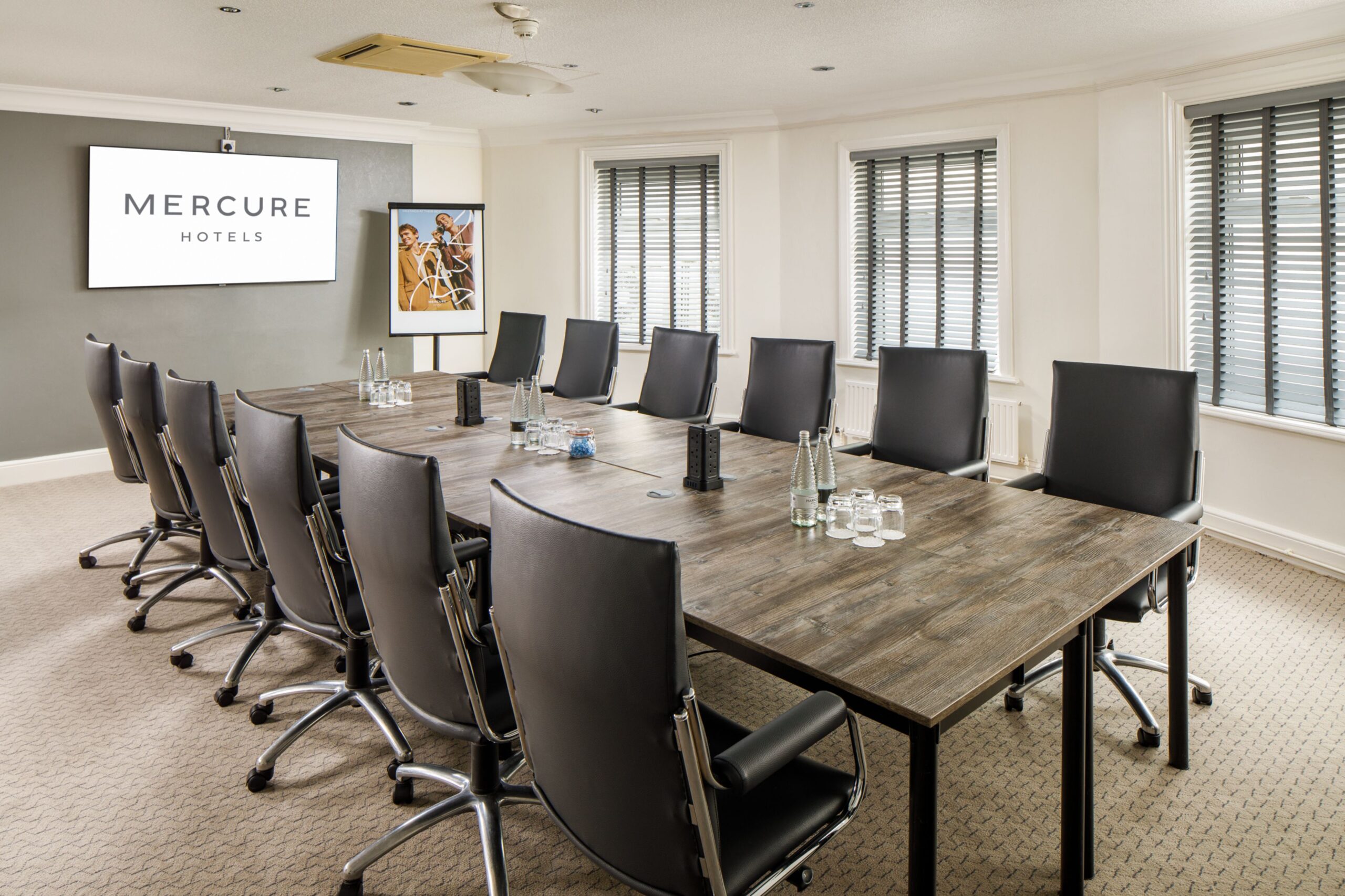 Dee Meeting room 2 Tables set for private dining in the senate room at mercure gloucester bowden hall hotel