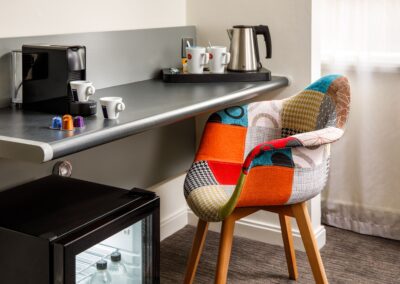 coffee, tea station and mini fridge in the superior room