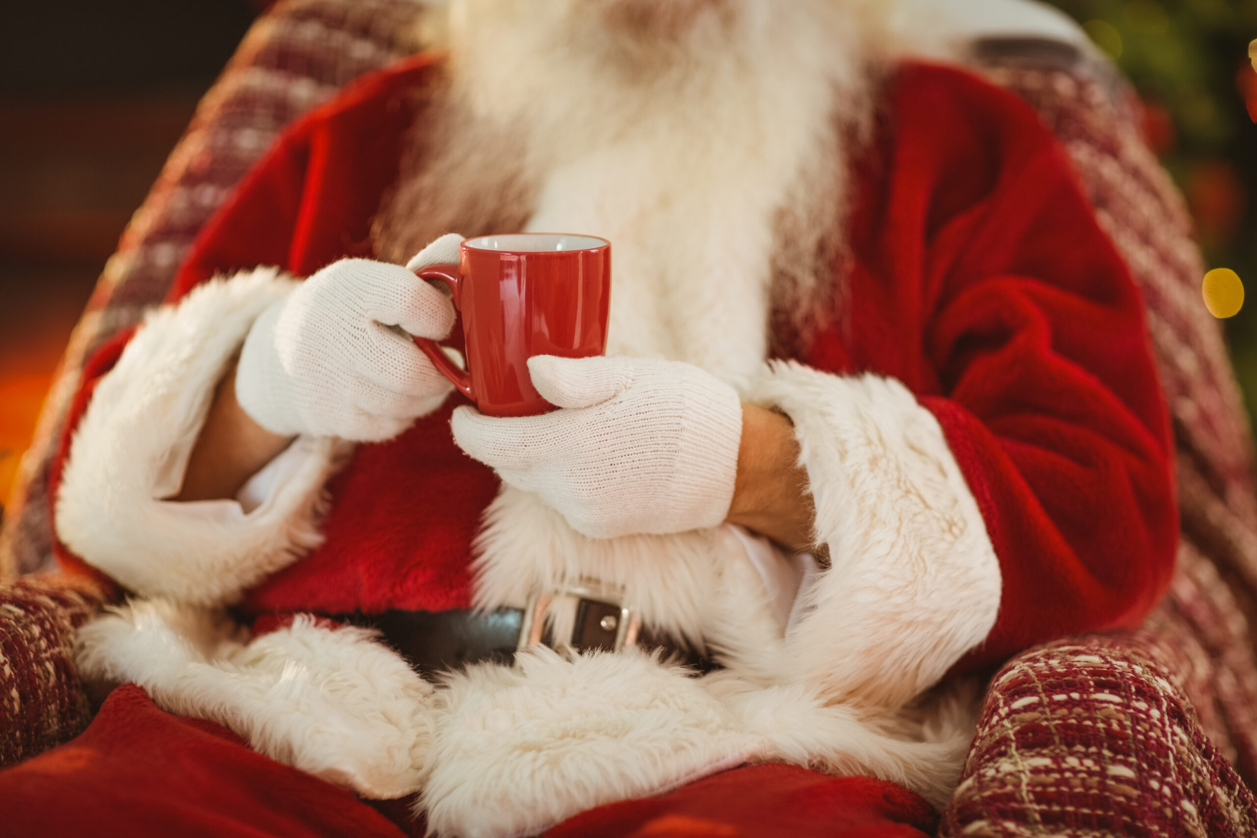 Mid,Section,Of,Santa,Holding,Hot,Drink,At,Home,In Classic double room at Mercure Chester Abbots Well Hotel