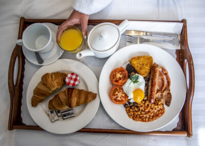 A tray of breakfast on bed